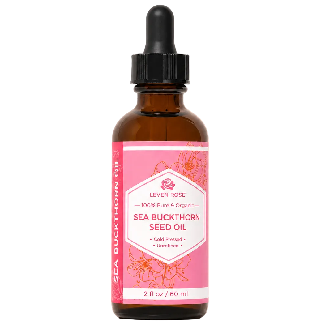 Bottle of Leven Rose Sea Buckthorn Seed Oil with a pink label on a beige background