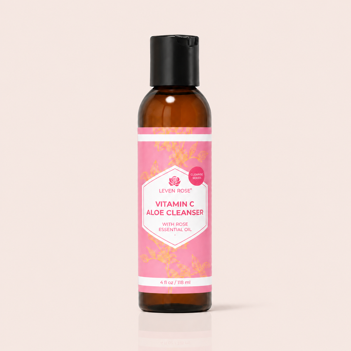 Bottle of Leven Rose Vitamin C Aloe Cleanser on a beige background