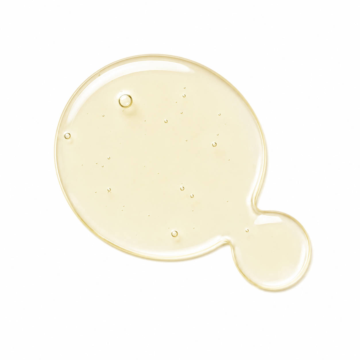 A glossy, translucent droplet of pale yellow cosmetic gel or oil on a solid white background.