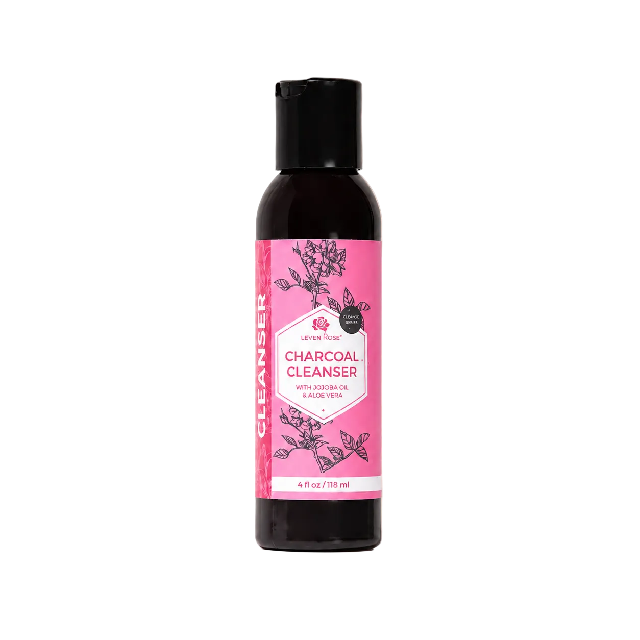 Bottle of charcoal cleanser with a pink label on a beige background