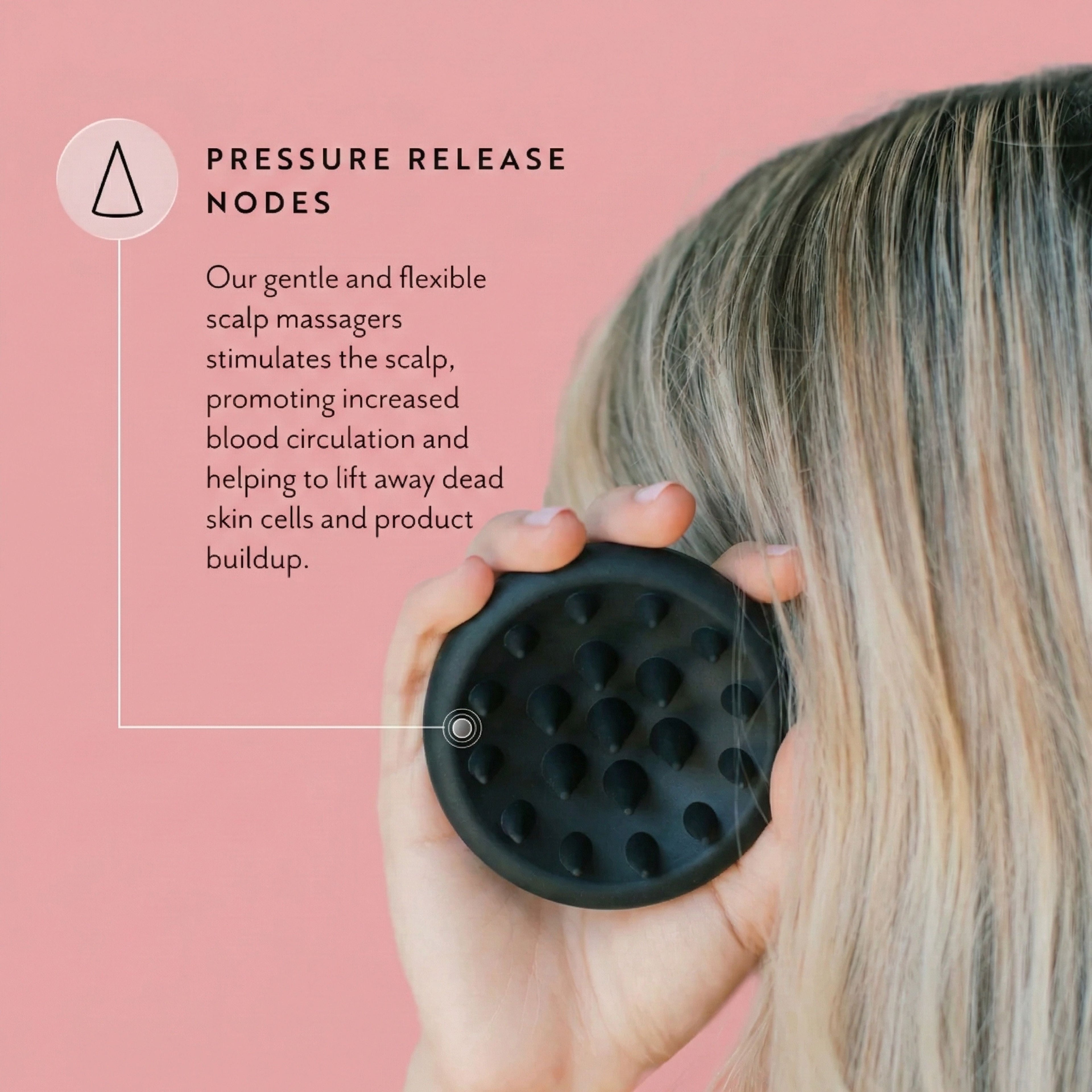 Person using a black scalp massager with text on a pink background