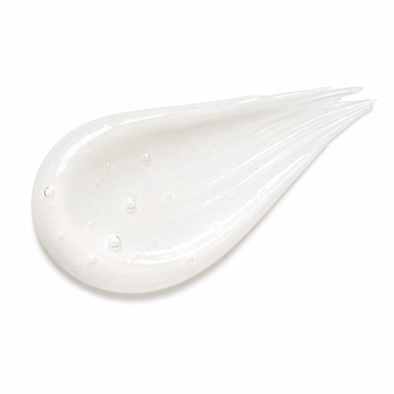A glossy smear of translucent white cosmetic cream or gel, showing small embedded air bubbles, on a clean white background.