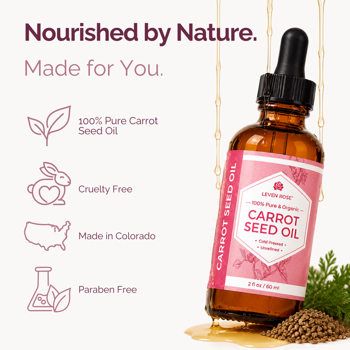 An amber glass dropper bottle of Leven Rose Carrot Seed Oil on a white background with promotional text and icons. The bottle has a pink label and black dropper cap, with honey dripping around it and carrot seeds and greenery at the base.