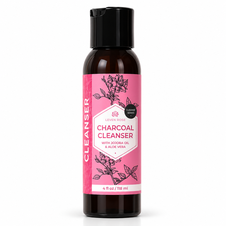 charcoal cleanser bottle with pink label