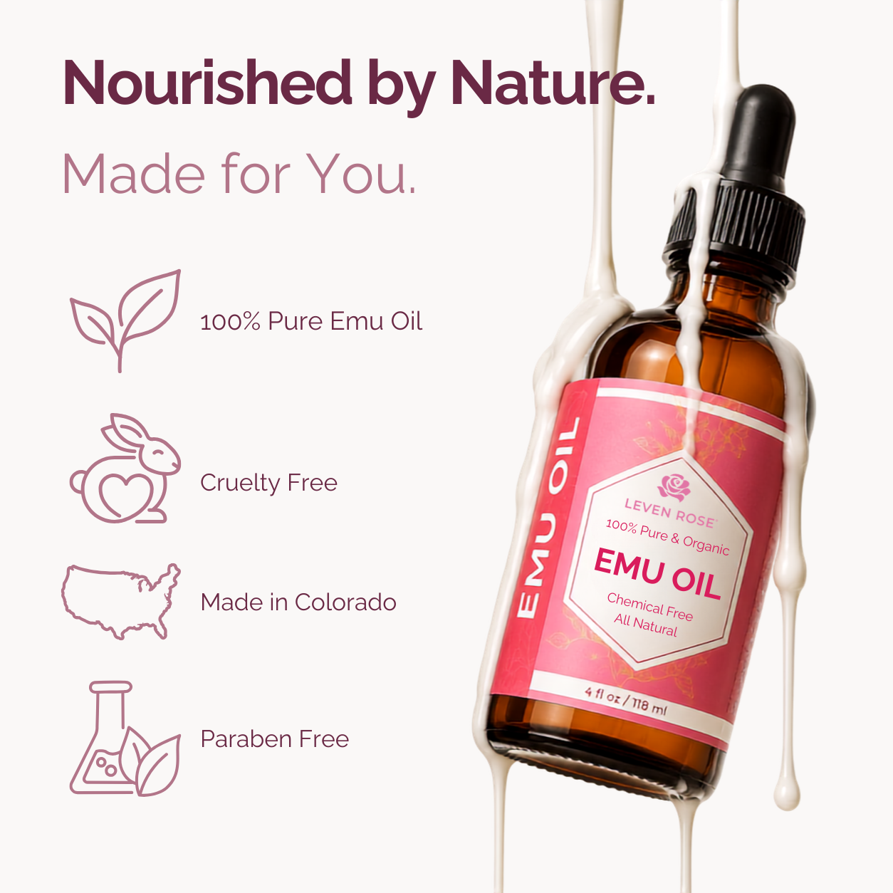 An amber glass dropper bottle of LEVEN ROSE EMU OIL with a pink label, shown on a light background with decorative white drips and marketing text/icons about pure emu oil, cruelty free, made in Colorado, and paraben free.