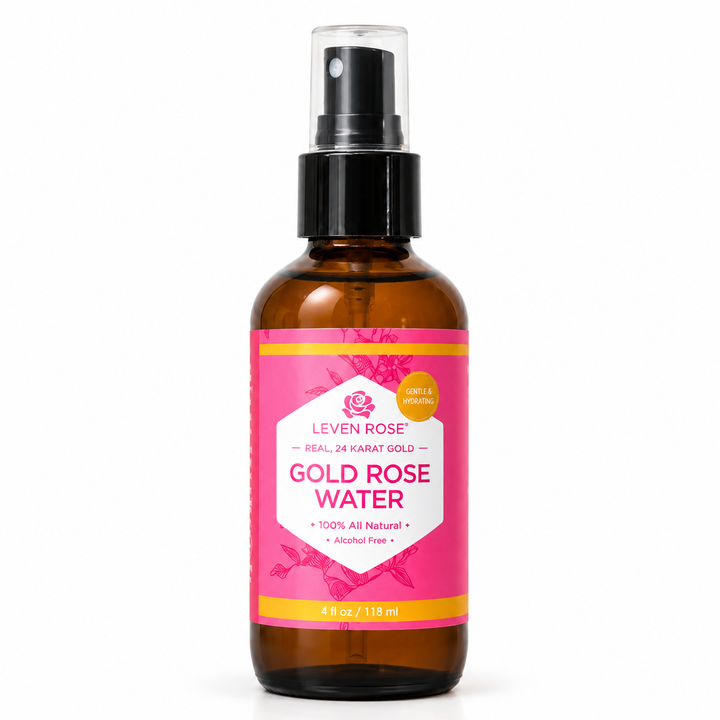 bottle of gold rose water toner with pink label and gold accents