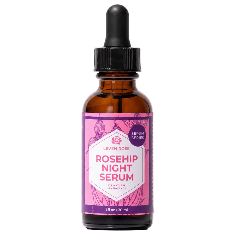 Rosehip night serum bottle with pink label on a white background