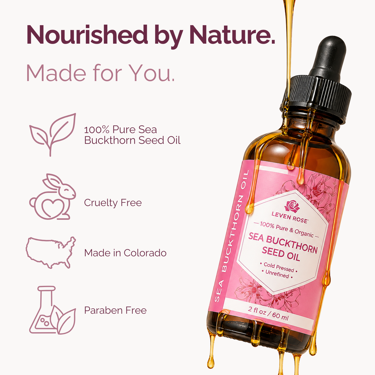 A bottle of sea buckthorn seed oil with a pink label and dropper cap, shown on a light background with promotional text and icons for pure sea buckthorn oil, cruelty free, made in Colorado, and paraben free. Leven Rose branding is visible on the label.