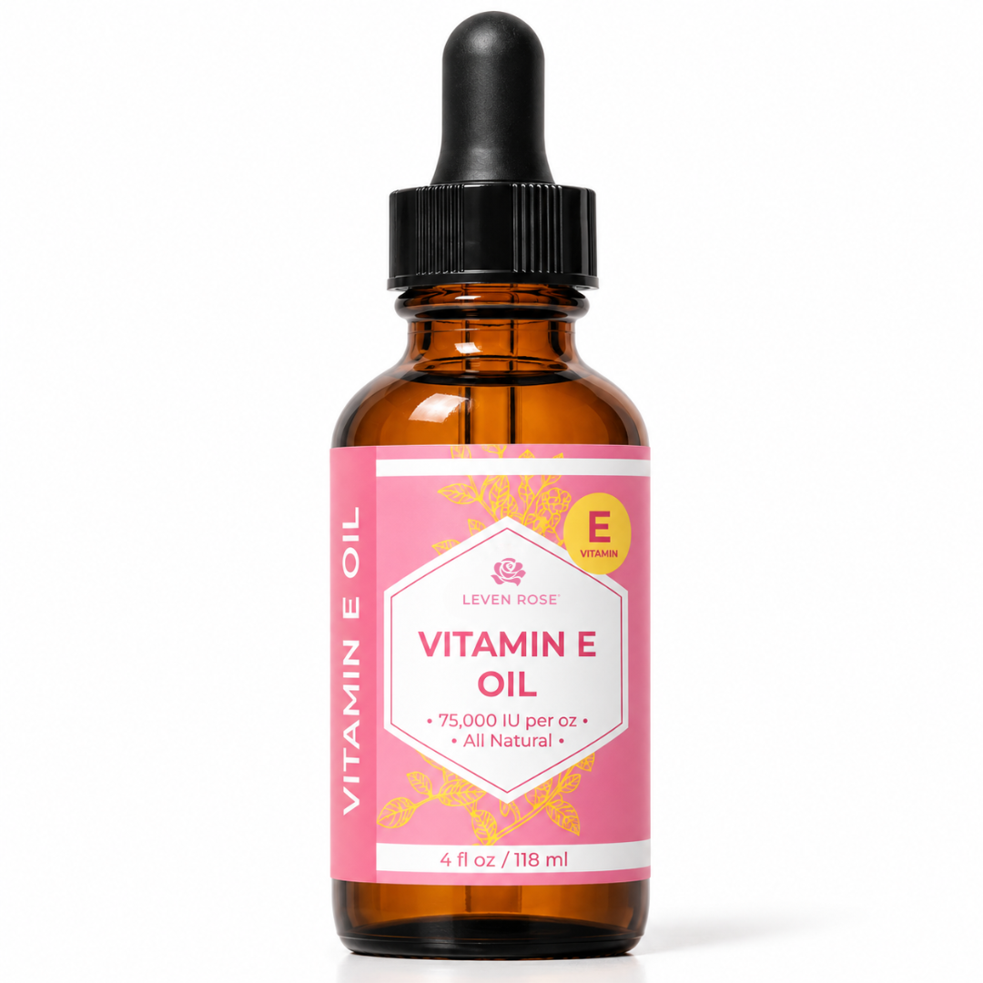A 4 fl oz amber glass dropper bottle of Lever Rose Vitamin E Oil with a pink label and black dropper cap, shown on a white background.